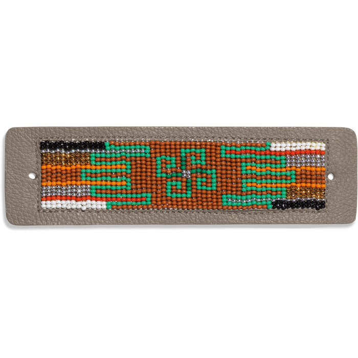 Brighton beaded leather patch with green, orange, brown, and silver geometric seed bead pattern on a white background