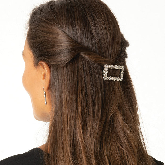 Model wearing a Brighton silver-plated rectangular hair clip with crystal accents in half-up styled hair