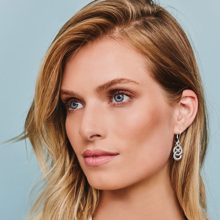 Side view of model wearing Interlok Braid Petite Leverback Earrings