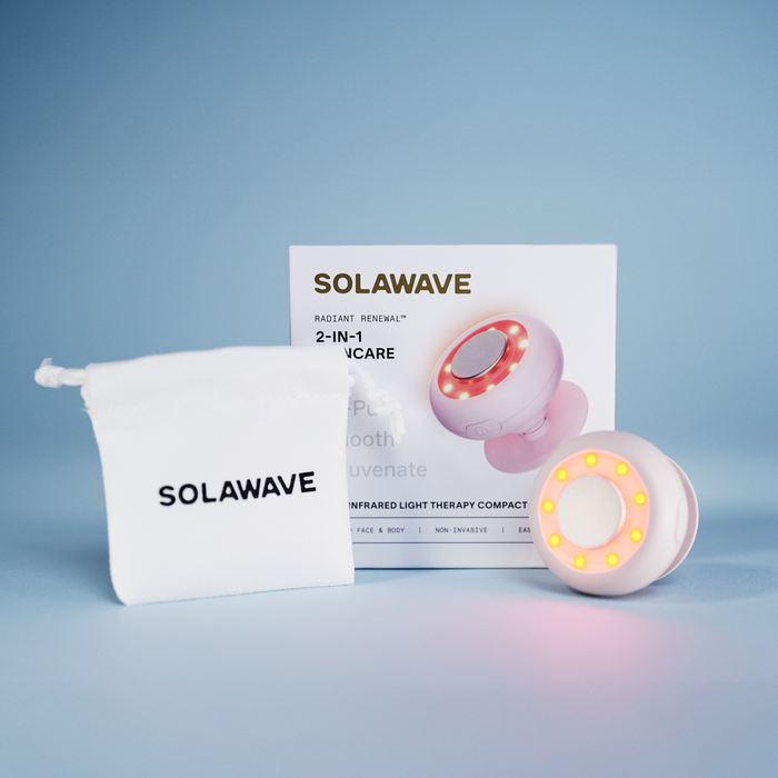 SOLAWAVE 2-in-1 skincare device with packaging and pouch on a light blue background