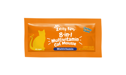 Orange packet of Zesty Paw 8-in-1 multivitamin cat mousse in chicken flavor with yellow cat silhouette.