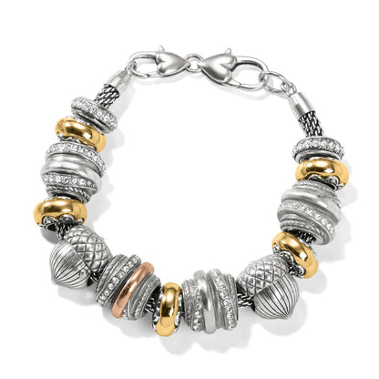 Brighton beaded bracelet with silver-plated, gold-tone, and rose-tone beads accented with crystal pave on a white background
