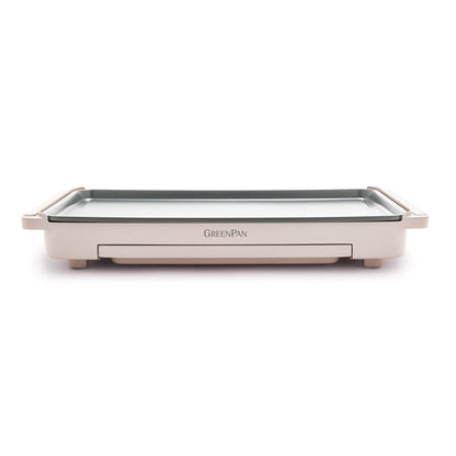 Clay-colored griddle with front-facing warming drawer and side handles, shown from the front.