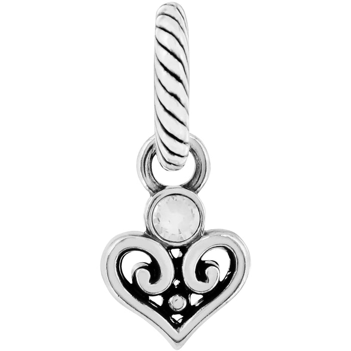 Brighton heart charm with silver-plated filigree scrollwork, crystal accent, and twisted rope bail on a white background