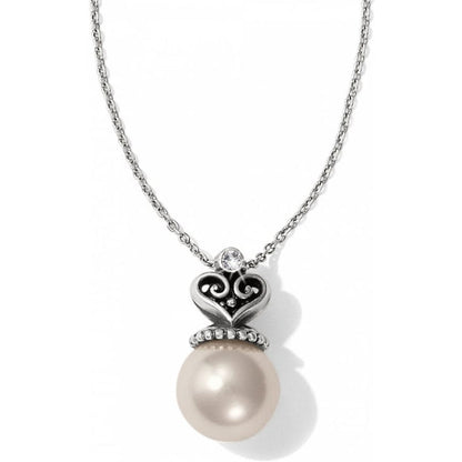 Brighton pendant necklace with large pearl, silver-plated heart filigree, and crystal accent on a white background