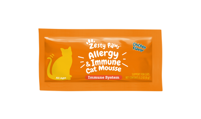 Orange packet of Zesty Paw Allergy & Immune Cat Mousse in chicken flavor with yellow cat silhouette.