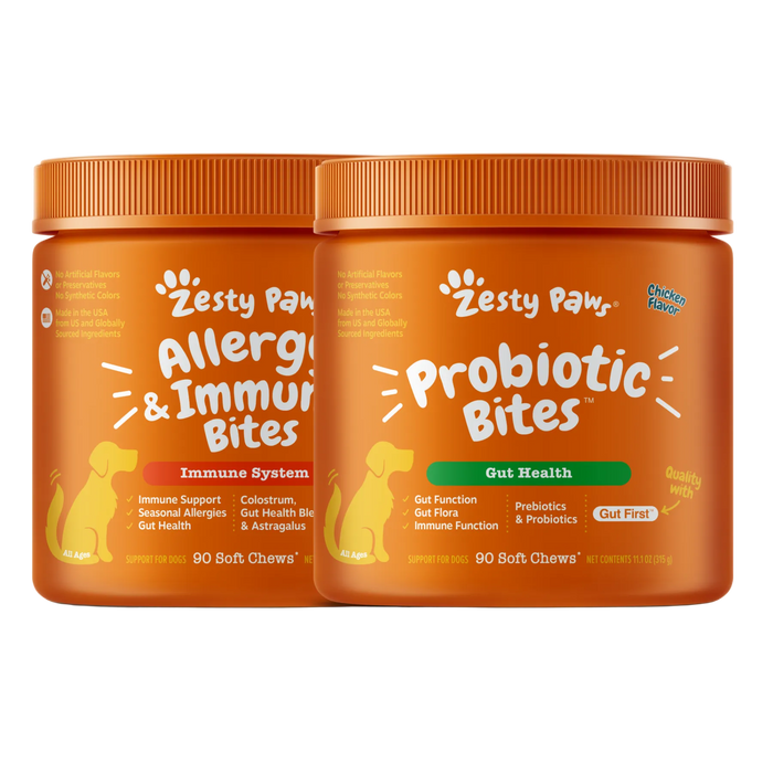 Two orange jars of Zesty Paws dog treats on a white background