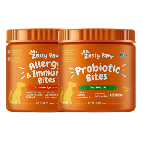 Two orange jars of Zesty Paws dog treats on a white background