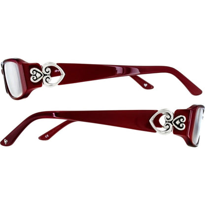 Brighton eyeglass frames in dark red with silver-tone scrollwork heart temple accents, side views on a white background