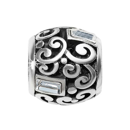 Brighton charm bead with silver-plated scroll openwork design and rectangular crystal accents on a white background