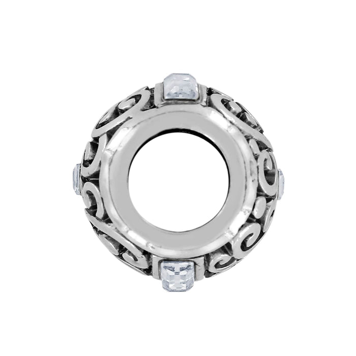 Brighton silver-plated spacer charm with scroll openwork design and crystal accents on a white background