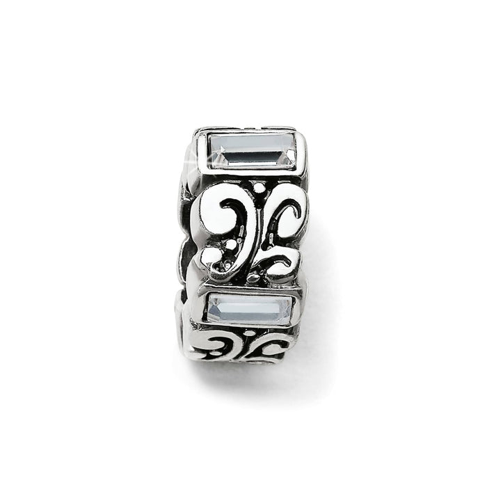 Brighton silver-plated spacer charm with scroll filigree design and clear crystal baguette accents on a white background