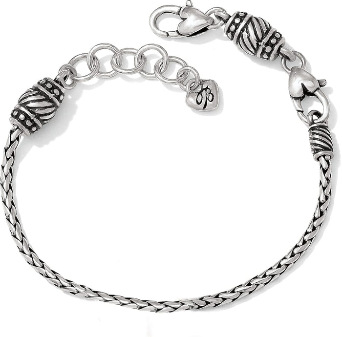 Brighton braided chain bracelet with silver-plated ornate beaded caps, lobster clasp, and heart charm on a white background