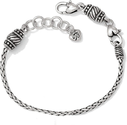 Brighton braided chain bracelet with silver-plated ornate beaded caps, lobster clasp, and heart charm on a white background