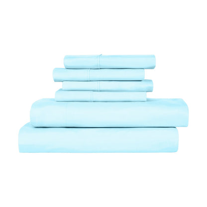 Set of light blue bed sheets stacked on a white background