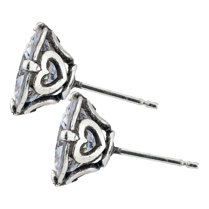 Brighton stud earrings with faceted crystal centers and silver-plated heart accents with posts on a white background