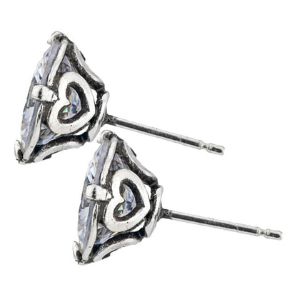 Brighton stud earrings with faceted crystal centers and silver-plated heart accents with posts on a white background
