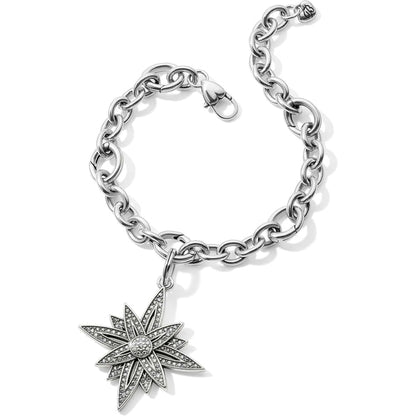 Brighton charm bracelet with silver-tone chain links and crystal-accented starburst pendant on a white background