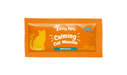 Orange packet of Zesty Paw Calming Cat Mousse with yellow cat silhouette and chicken flavor label.