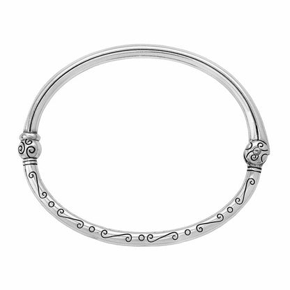 Brighton bangle bracelet with silver-plated finish and engraved scroll and dot detailing on a white background