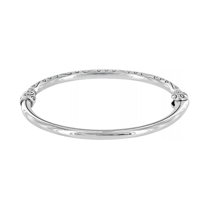 Brighton bangle bracelet with silver-plated finish and engraved scroll detailing along the top on a white background