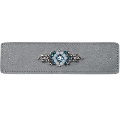 Brighton gray leather bracelet strap with blue crystal and silver-tone beaded centerpiece on a white background