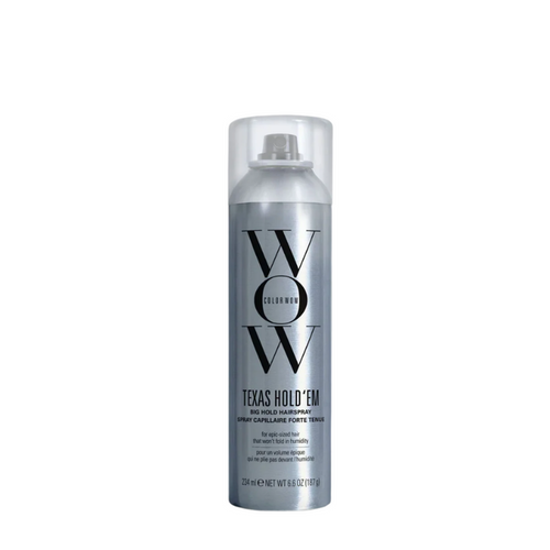 Hair spray can with 'WOW' branding on a white background