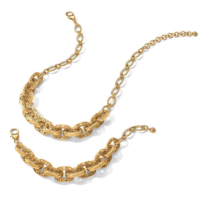 Brighton gold-plated necklace and bracelet set with chunky textured oval link chains and lobster clasps on a white background