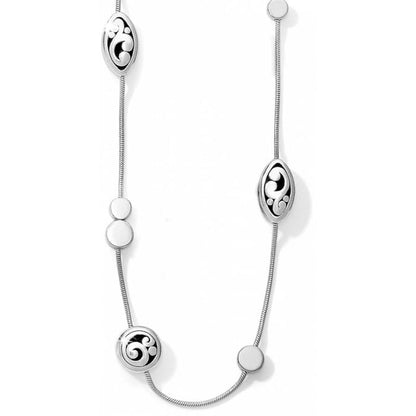 Brighton station necklace with silver-plated oval scroll medallions and round bead accents on a white background