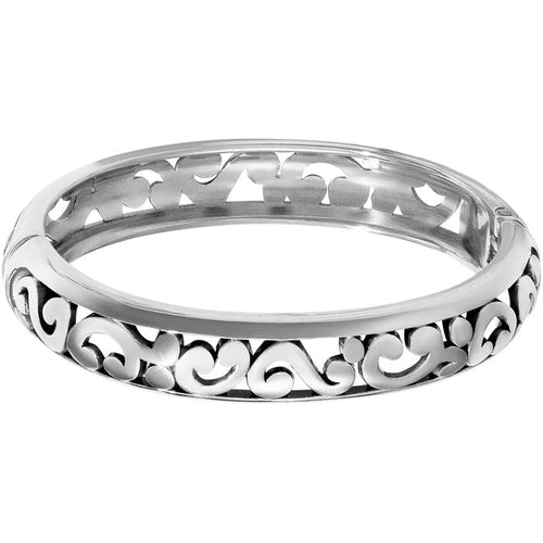 Brighton bangle bracelet with silver-plated openwork scroll filigree design and polished rounded edges on a white background