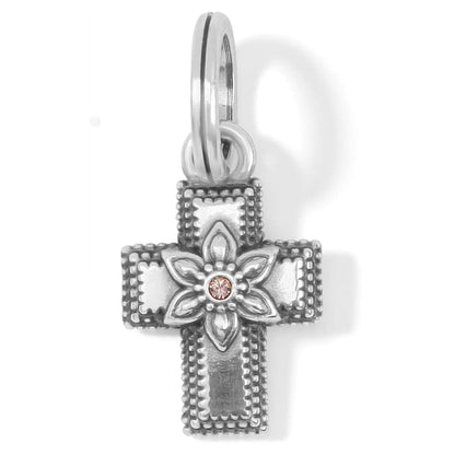 Brighton cross charm in silver-plated finish with floral center design and pink crystal accent on a white background