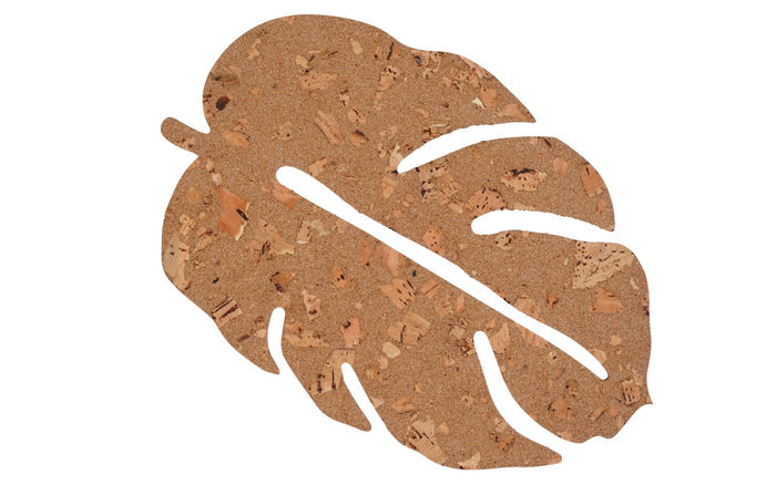 Cork coaster with leaf design on a white background