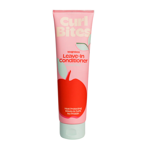 A tube of Curl Bites Weightless Leave-In Conditioner with a pink background and a picture of an apple. The text on the tube indicates that it is a leave-in conditioner and mentions apple extract.