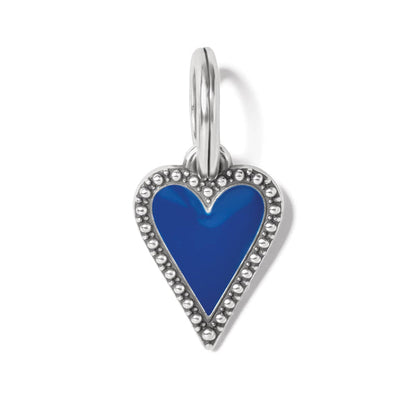 Brighton heart charm with blue enamel center and silver-plated beaded border with split ring on a white background