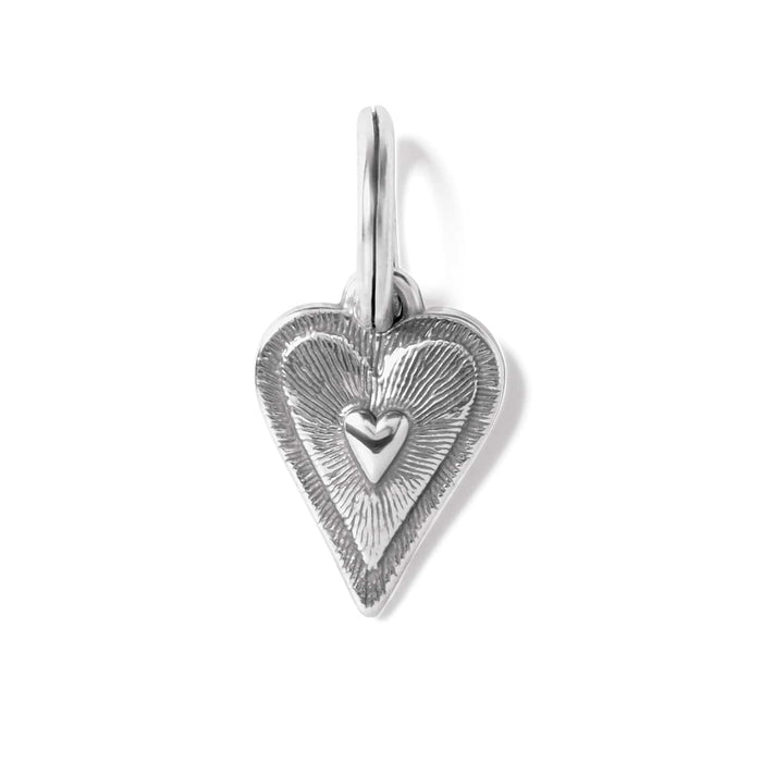 Brighton heart charm with silver-plated finish, textured radiating pattern, and small raised heart center on a white background