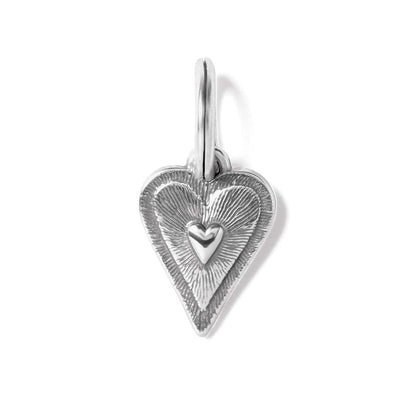 Brighton heart charm with silver-plated finish, textured radiating pattern, and small raised heart center on a white background