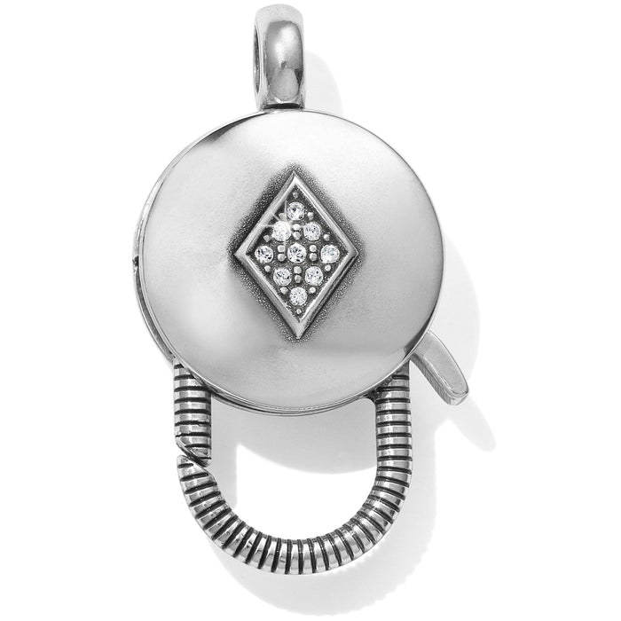 Brighton silver-plated clip charm holder with diamond-shaped crystal pave motif and ribbed clasp on a white background