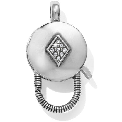 Brighton silver-plated clip charm holder with diamond-shaped crystal pave motif and ribbed clasp on a white background