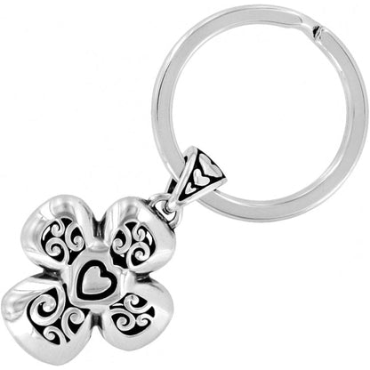 Brighton keychain with silver-plated flower charm featuring scrollwork detail and centered heart motif on a white background