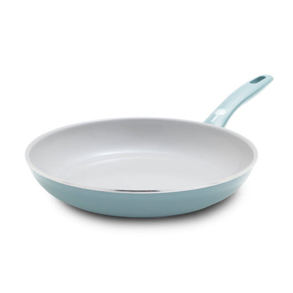 Blue frypan with white ceramic interior, 10-inch size. Handle attached, shown against a plain background.