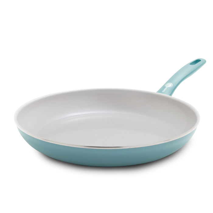 Blue haze ceramic 12-inch frypan with white interior and stay-cool handle on a white background.
