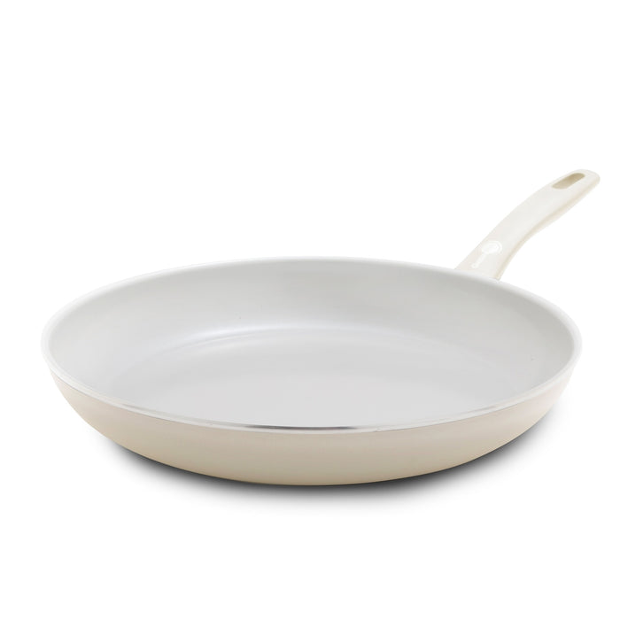 Cream white ceramic 12-inch frypan with a smooth nonstick interior and a long, light-colored stay-cool handle.