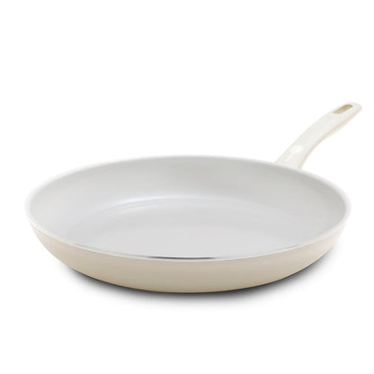 Cream white ceramic 12-inch frypan with a smooth nonstick interior and a long, light-colored stay-cool handle.