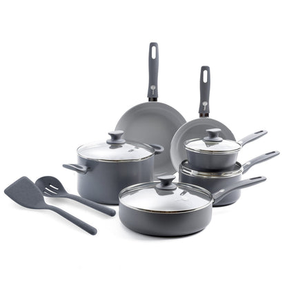 Charcoal gray ceramic 12-piece cookware set with glass lids, pans, pots, and utensils displayed together.