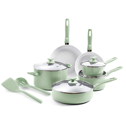 Pastel green 12-piece ceramic cookware set with glass lids and matching utensils displayed together.