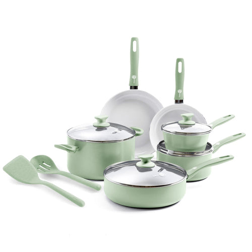 Pastel green 12-piece ceramic cookware set with glass lids and matching utensils displayed together.