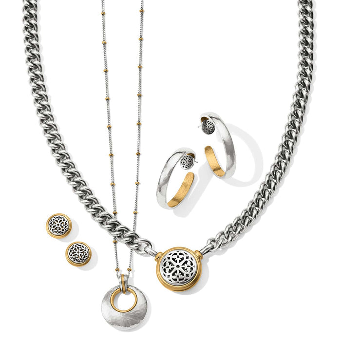 Brighton jewelry set styled with two-tone silver and gold necklaces, hoop earrings, and stud earrings on white background