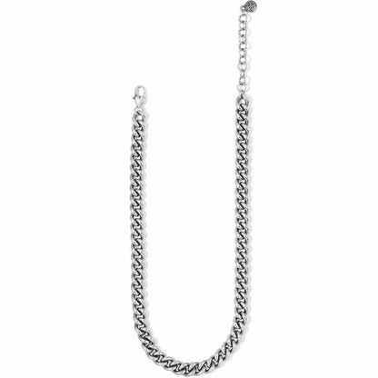 Brighton curb chain necklace with silver-plated links, lobster clasp, and small medallion charm on a white background