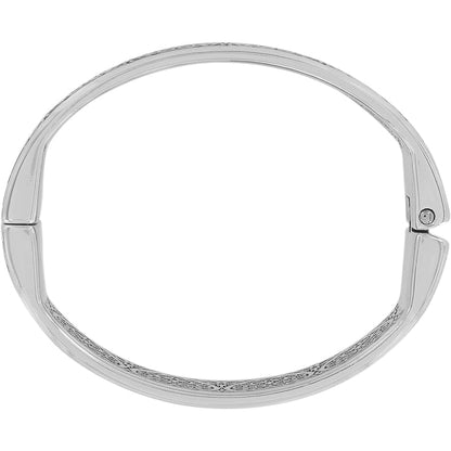 Brighton bangle bracelet shown from above with silver-plated finish and engraved scroll detailing on a white background