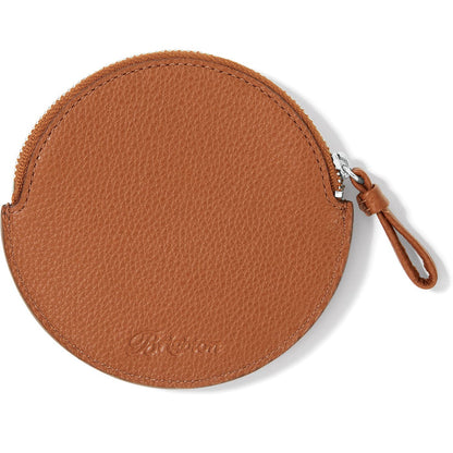 Brighton round leather zip pouch in tan with embossed logo and leather wristlet pull on a white background